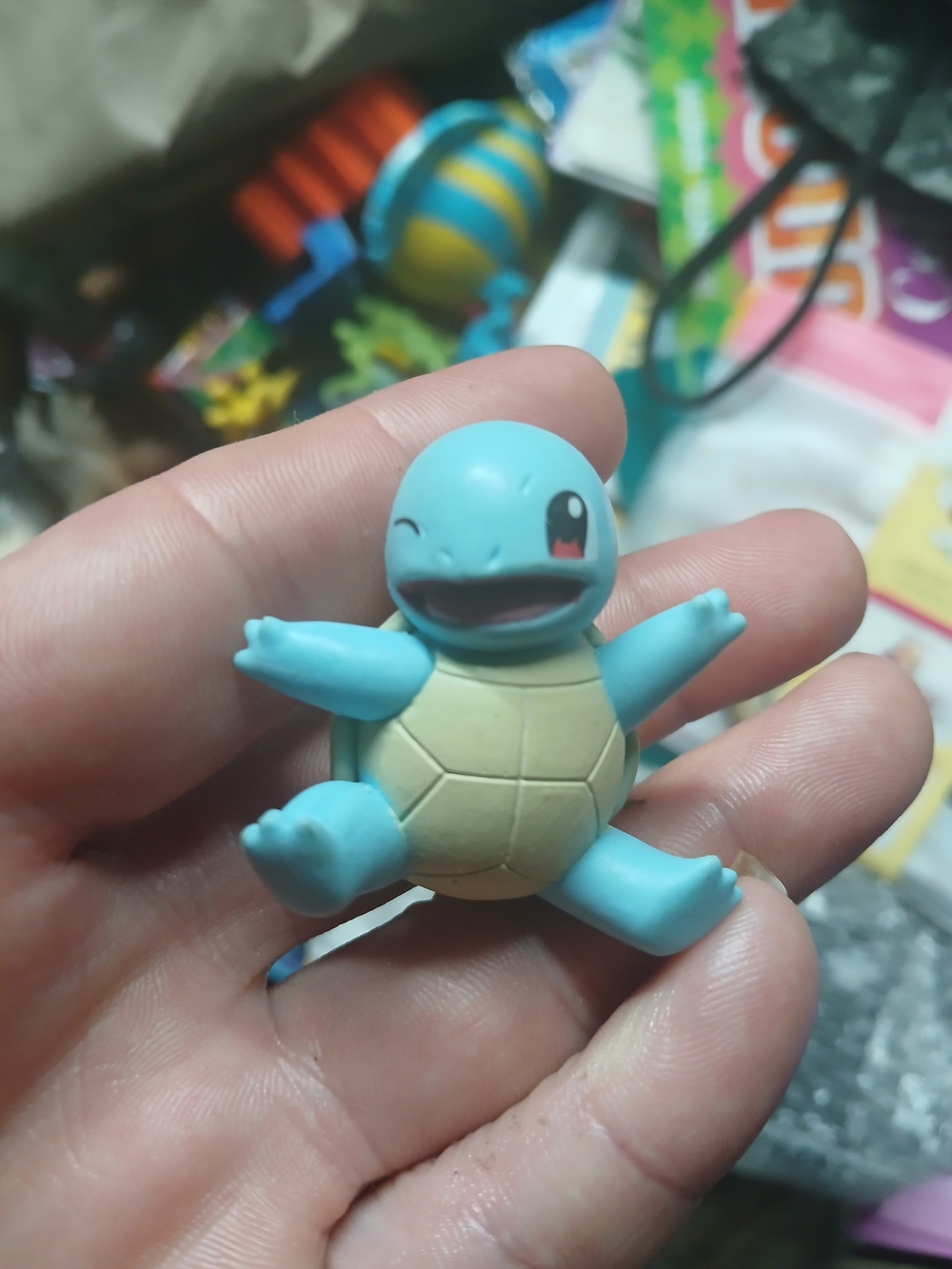 small collectible figurine of Squirtle, the Water-type starter Pokémon
